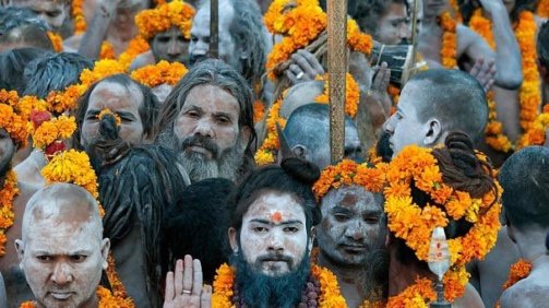 Devotees gathered at Mahakumbh Mela 2025, taking a holy dip in the sacred river during the grand spiritual festival.